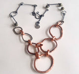 Hoops, sterling silver, pyrite, and copper necklace