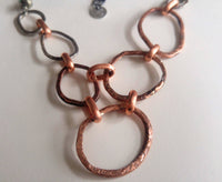 Hoops, sterling silver, pyrite, and copper necklace